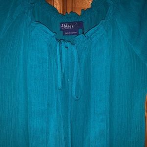 Teal blouse cinched and ruffled